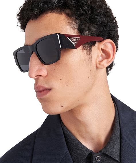 Prada PR 10ZS Sunglasses .